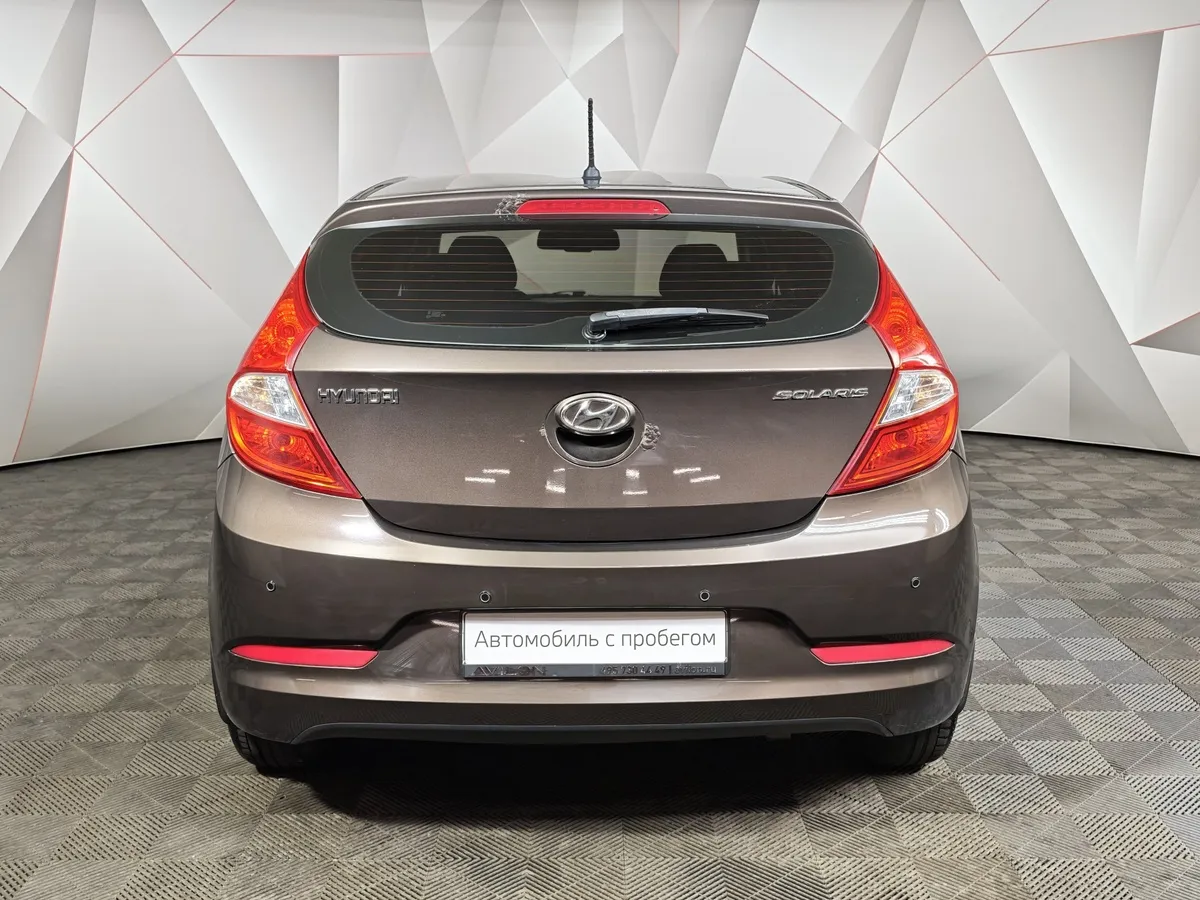 Hyundai Solaris 1.4 AT (107 л.с.) Classic Коричневый в АВИЛОН. Слайд №8