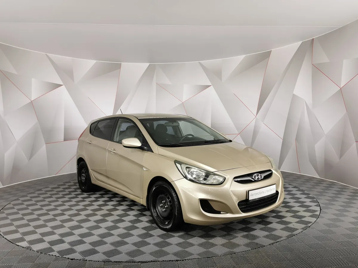 Hyundai Solaris 1.4 AT (107 л.с.) Active Бежевый в АВИЛОН. Слайд №3