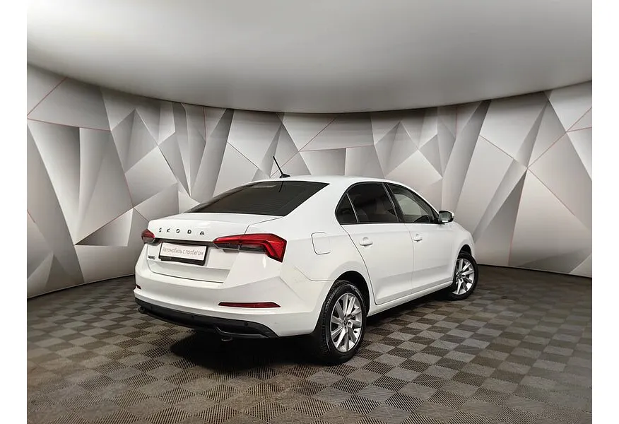 Skoda Rapid 1.6 MT (90 л.с.) Белый в АВИЛОН. Слайд №2