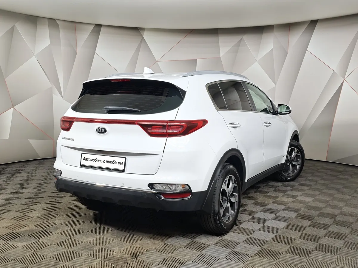 Kia Sportage 2.0 MPI AT 4WD (150 л.с.) Luxe Белый в АВИЛОН. Слайд №2