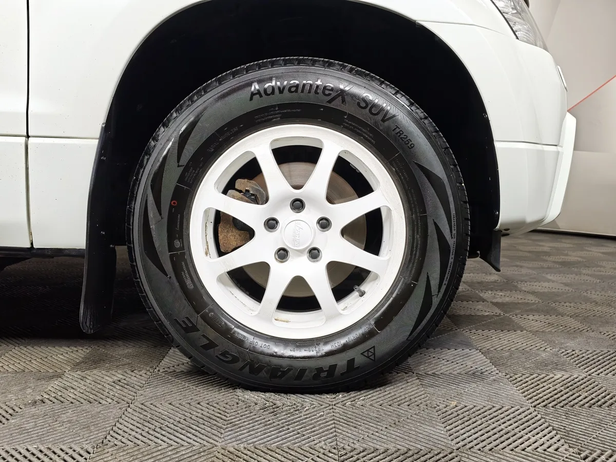 Suzuki Grand Vitara 2.4 AT AWD (169 л.с.) JLX-A Белый в АВИЛОН. Слайд №9