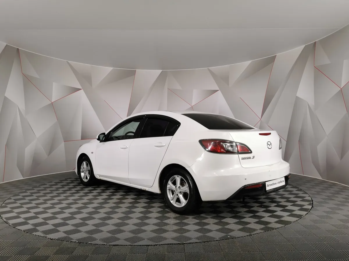 Mazda 3 1.6 AT (105 л.с.) Белый в АВИЛОН. Слайд №4