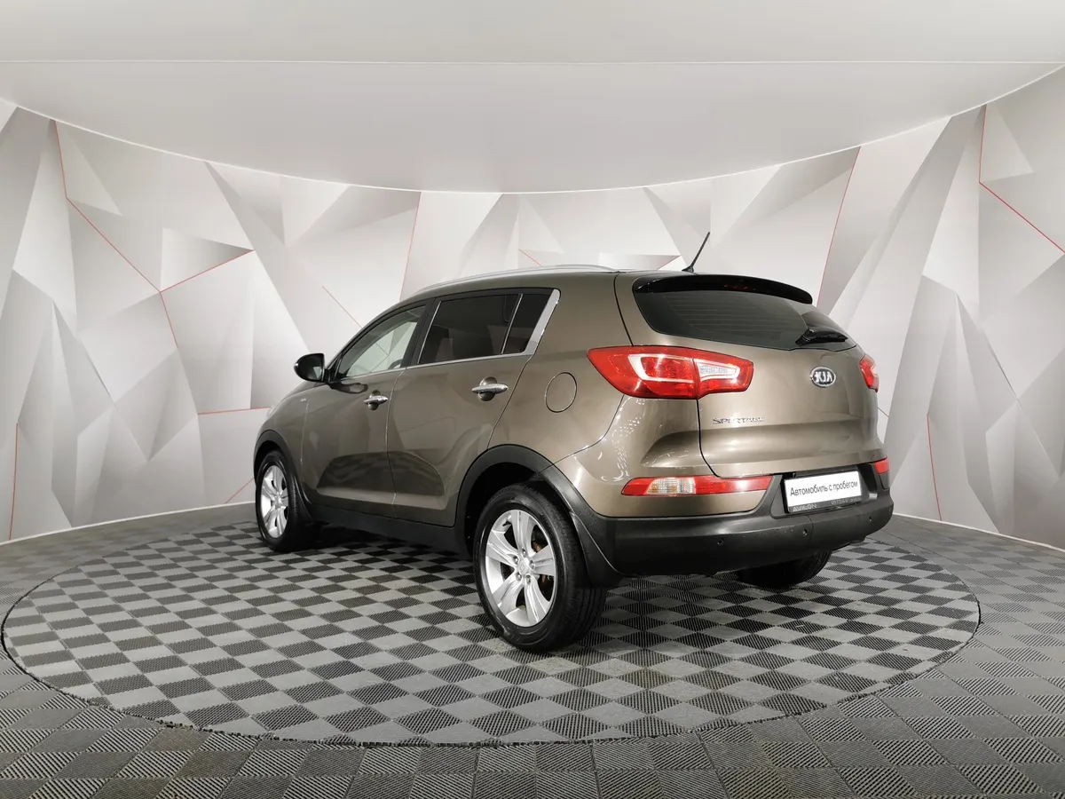Kia Sportage 2.0 AT 4WD (150 л.с.) Luxe Коричневый в АВИЛОН. Слайд №4