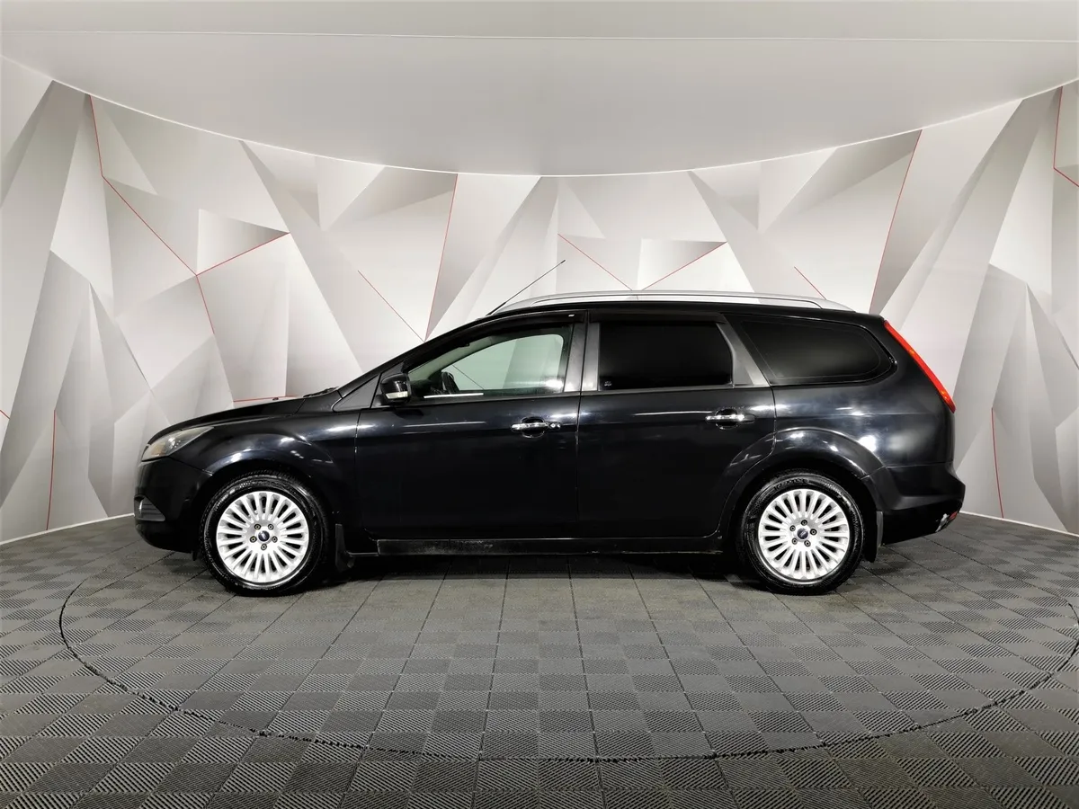 Ford Focus 2.0 AT (145 л.с.) Ghia Черный в АВИЛОН. Слайд №5