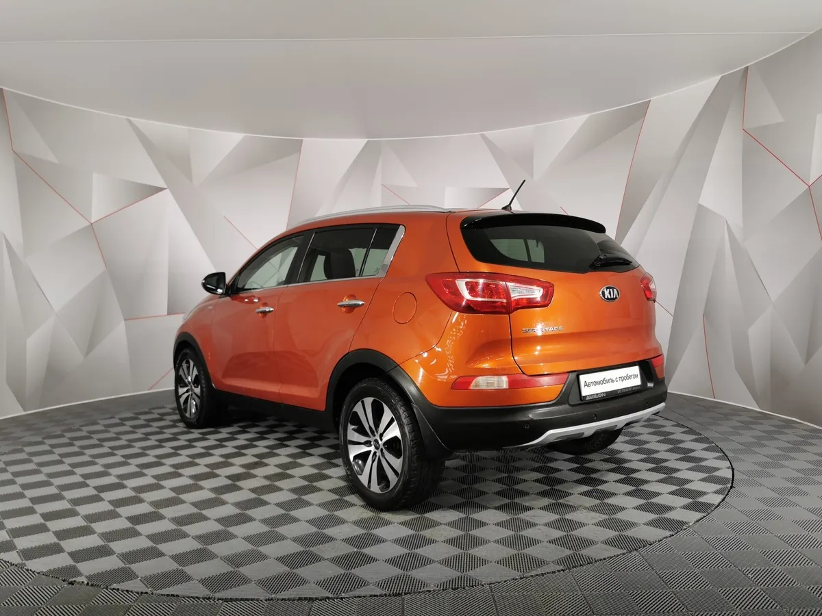 Kia Sportage 2.0 AT 4WD (150 л.с.) Luxe Оранжевый в АВИЛОН. Слайд №4