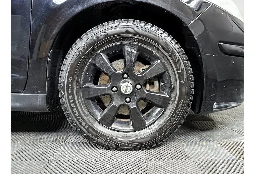 Nissan Tiida 1.6 AT (110 л.с.) Черный в АВИЛОН. Слайд №9