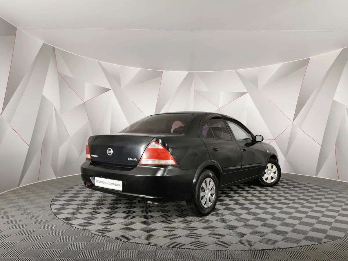 Nissan Almera Classic 1.6 MT (107 л.с.) Черный в АВИЛОН. Слайд №2