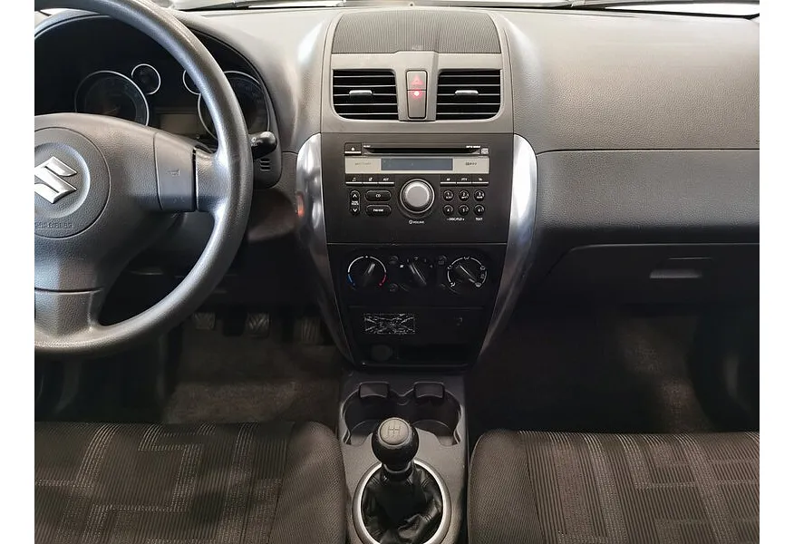 Suzuki SX4 1.6 MT (107 л.с.) Серебристый в АВИЛОН. Слайд №14