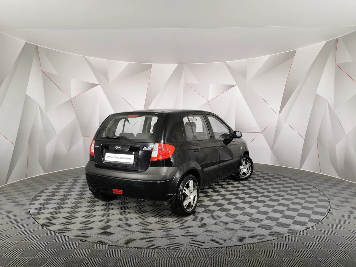 Hyundai Getz 1.4 AT (97 л.с.) Черный в АВИЛОН. Слайд №2