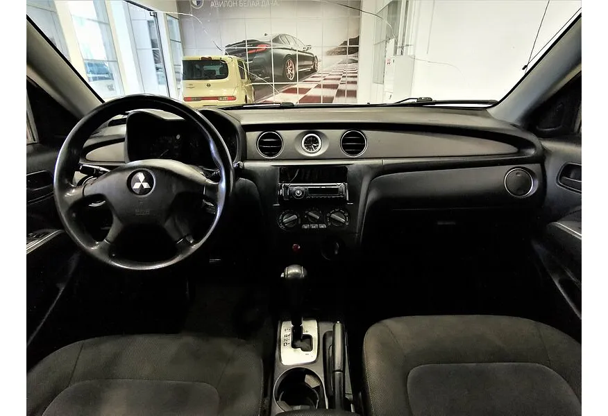 Mitsubishi Outlander 2.4 AT 4WD (160 л.с.) Белый в АВИЛОН. Слайд №13