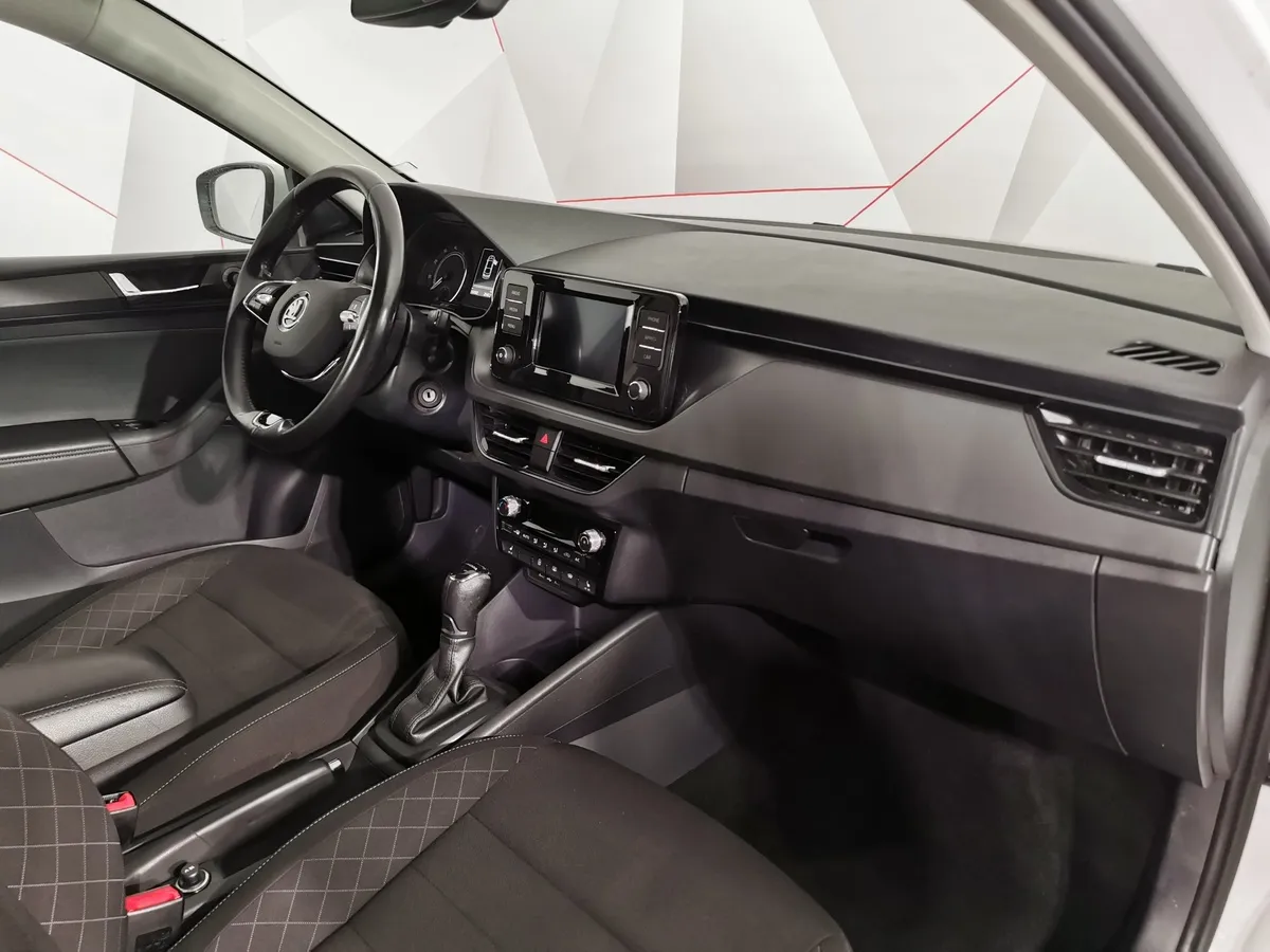 Skoda Rapid 1.6 AT (110 л.с.) Белый в АВИЛОН. Слайд №12