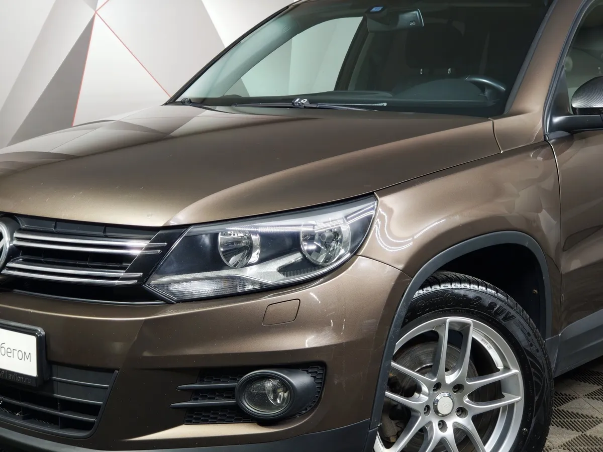 Volkswagen Tiguan 1.4 TSI BlueMotion DSG (150 л.с.) Коричневый в АВИЛОН. Слайд №10