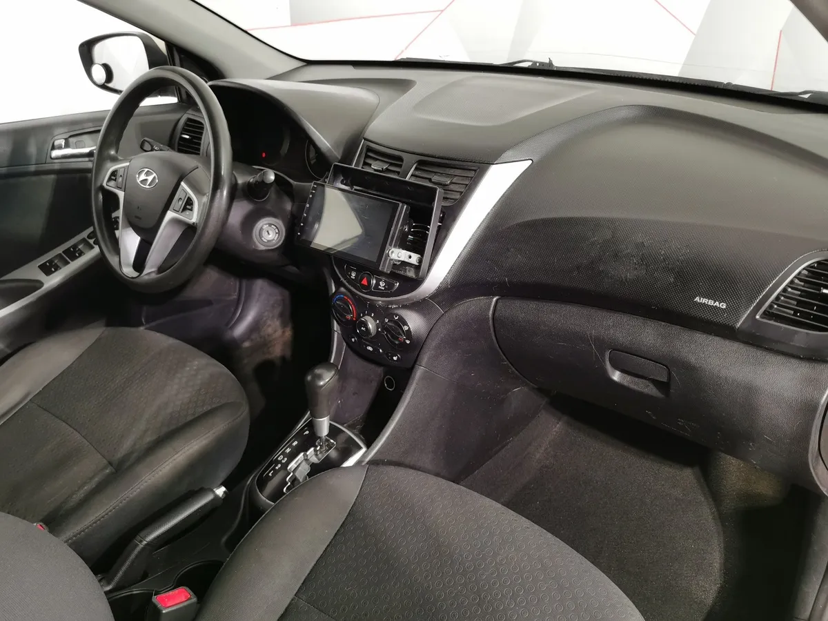 Hyundai Solaris 1.4 AT (107 л.с.) Active Бежевый в АВИЛОН. Слайд №12