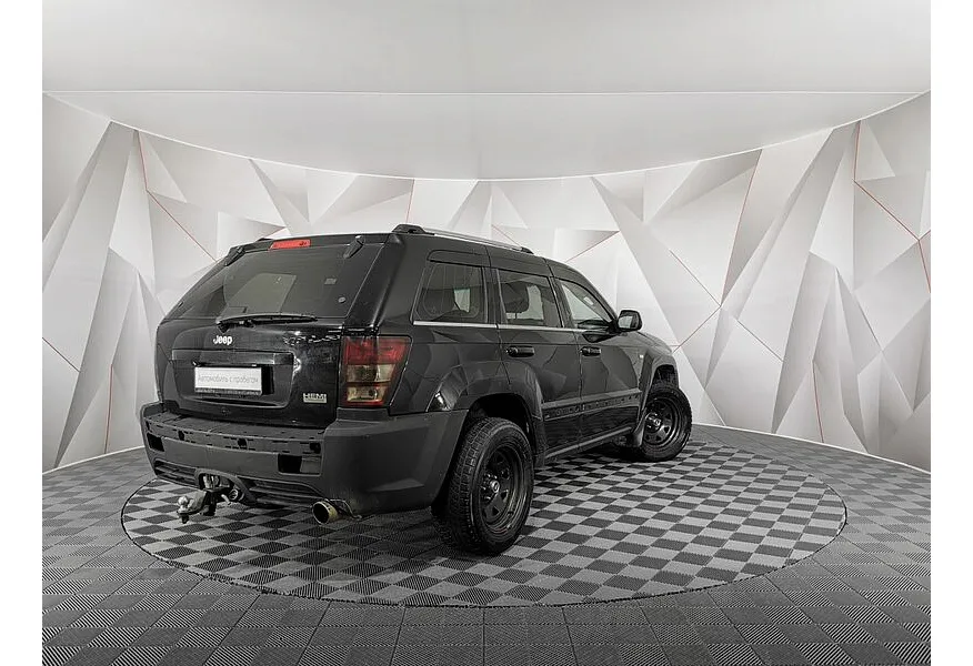 Jeep Grand Cherokee 4.7 AT AWD (305 л.с.) Черный в АВИЛОН. Слайд №2