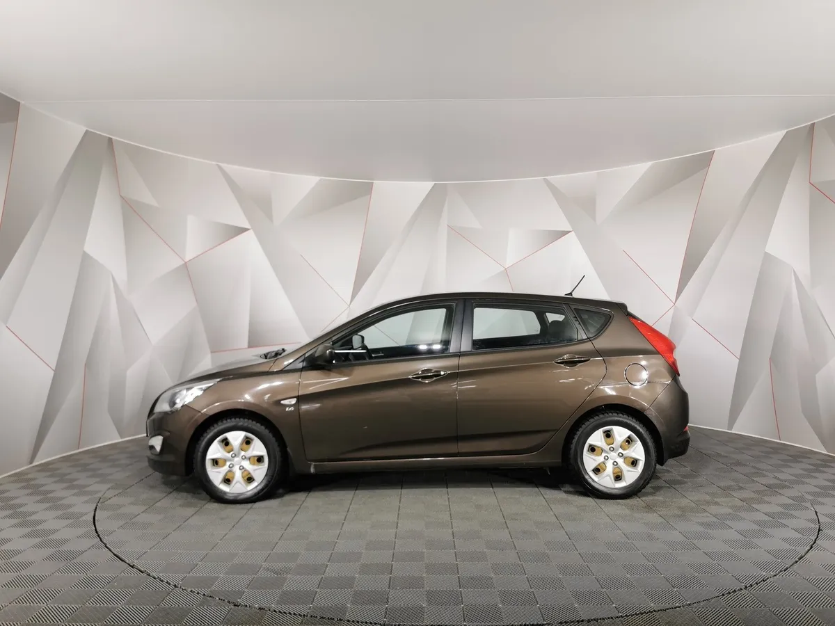 Hyundai Solaris 1.6 MT (123 л.с.) Comfort Коричневый в АВИЛОН. Слайд №5