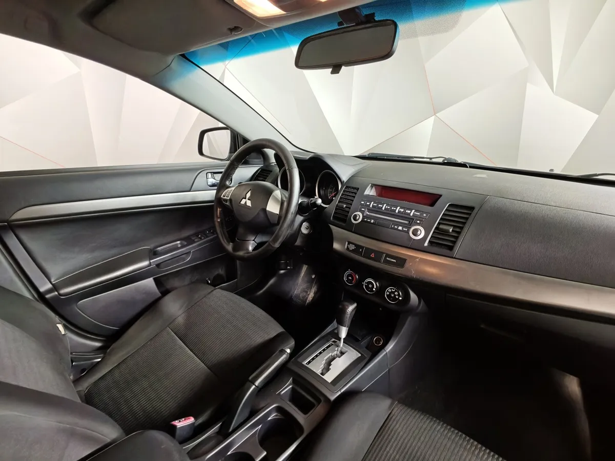 Mitsubishi Lancer 1.6 AT (117 л.с.) Серый в АВИЛОН. Слайд №13