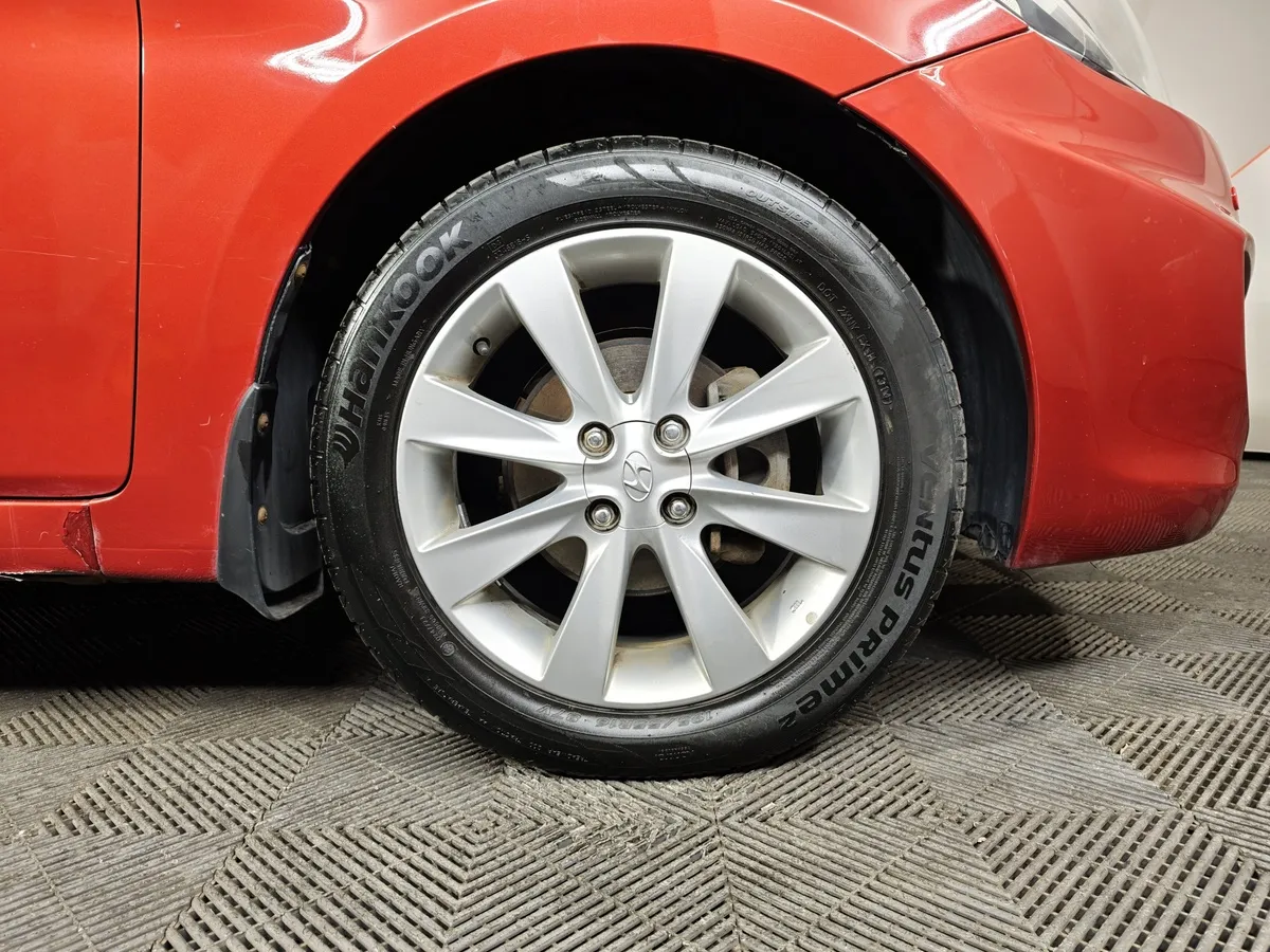 Hyundai Solaris 1.4 AT (100 л.с.) Active Красный в АВИЛОН. Слайд №9