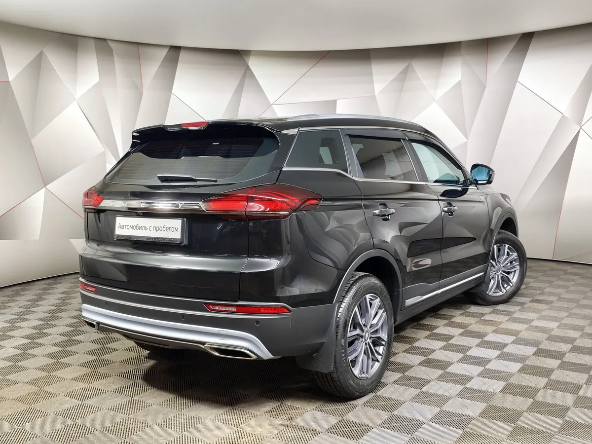 Geely Atlas Pro 1.5T 7DCT AWD (177 л.с.) Flagship Черный в АВИЛОН. Слайд №2