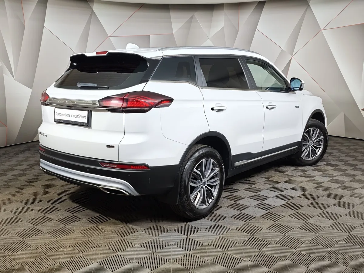 Geely Atlas Pro 1.5T 7DCT AWD (177 л.с.) Flagship Белый в АВИЛОН. Слайд №2