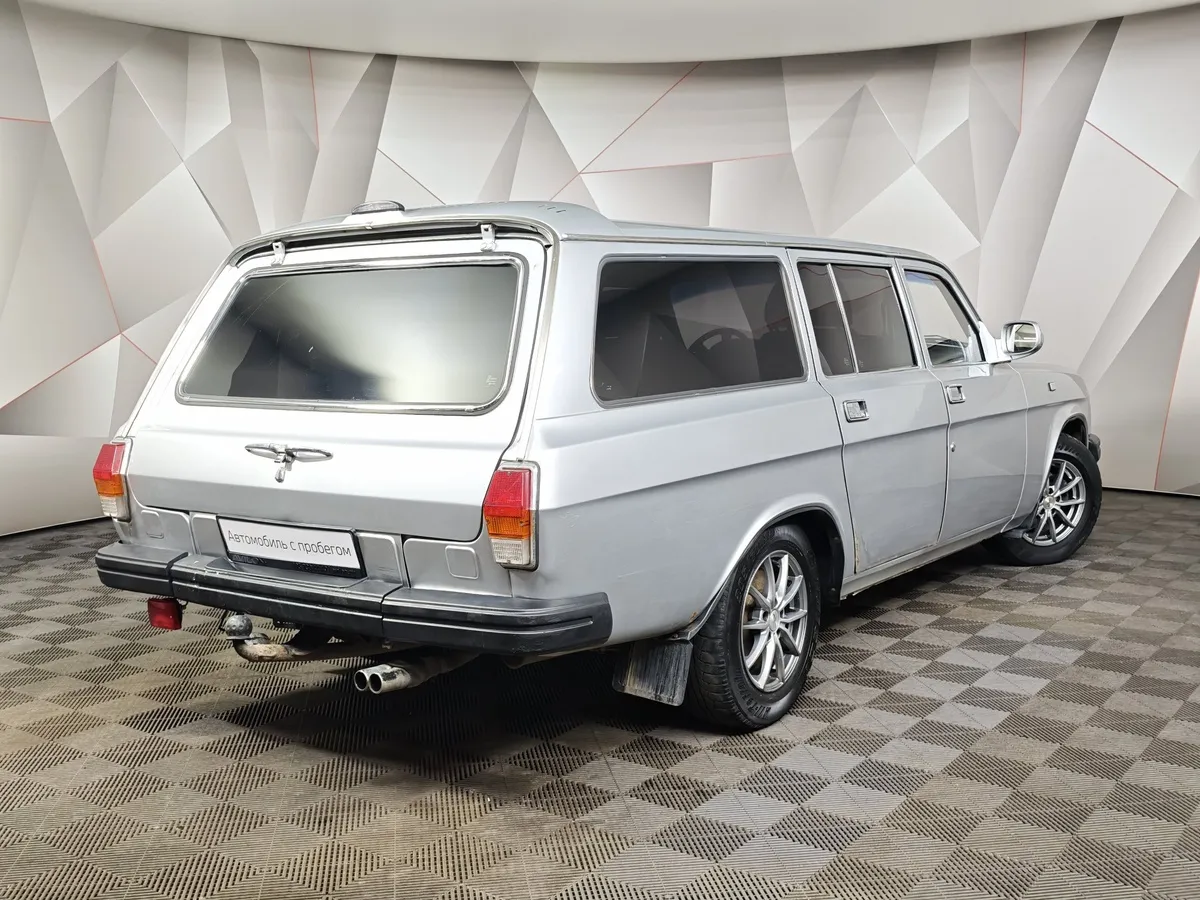 ГАЗ 310221 Волга 2.3 MT (131 л.с.) Серебристый в АВИЛОН. Слайд №2