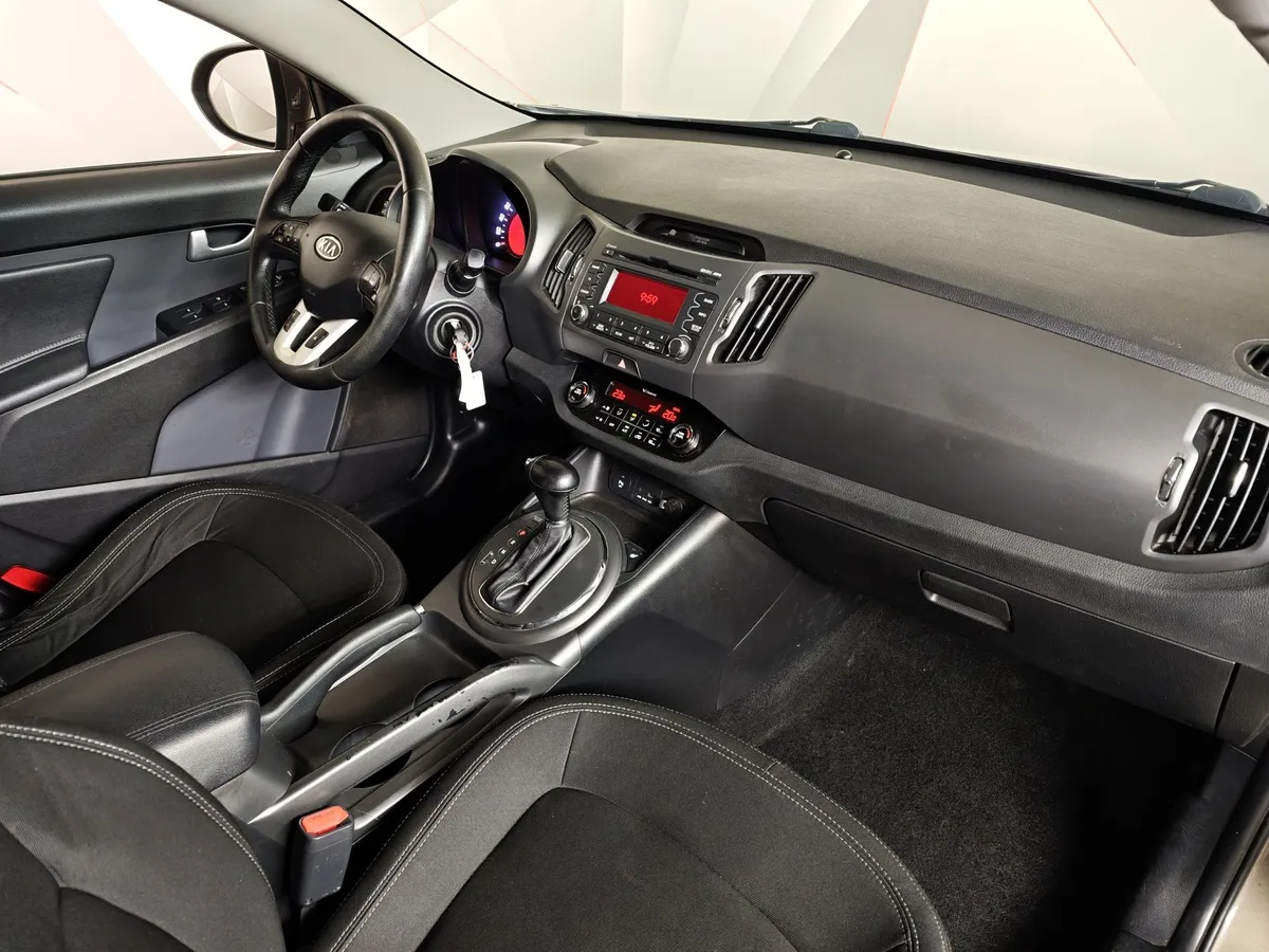 Kia Sportage 2.0 AT 4WD (150 л.с.) Luxe Коричневый в АВИЛОН. Слайд №13