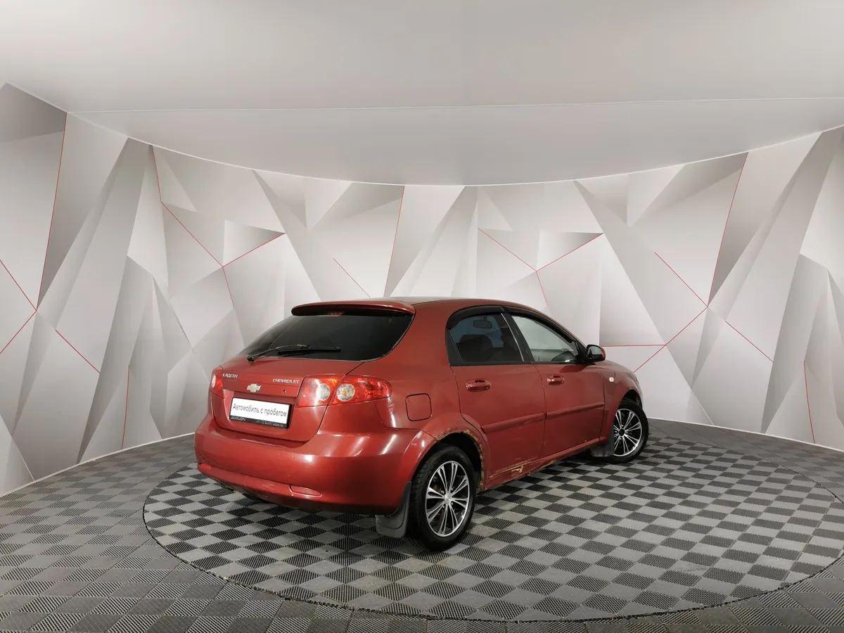 Chevrolet Lacetti 1.6 MT (109 л.с.) Platinum Красный в АВИЛОН. Слайд №2