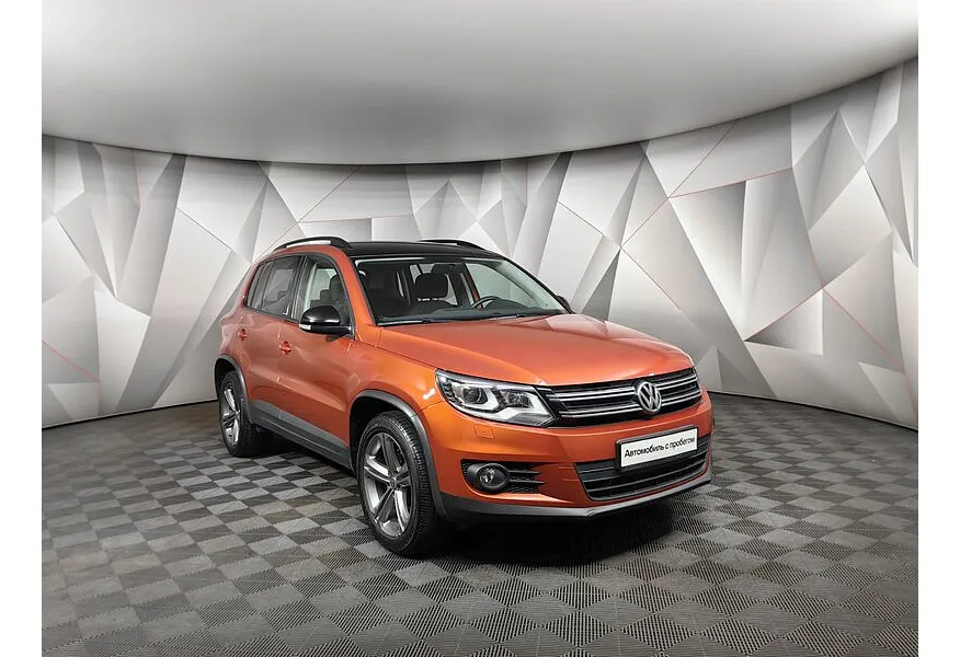 АВИЛОН - Volkswagen Tiguan 1.4 TSI BlueMotion DSG (150 л.с.) Sport&Style Оранжевый - slide 1