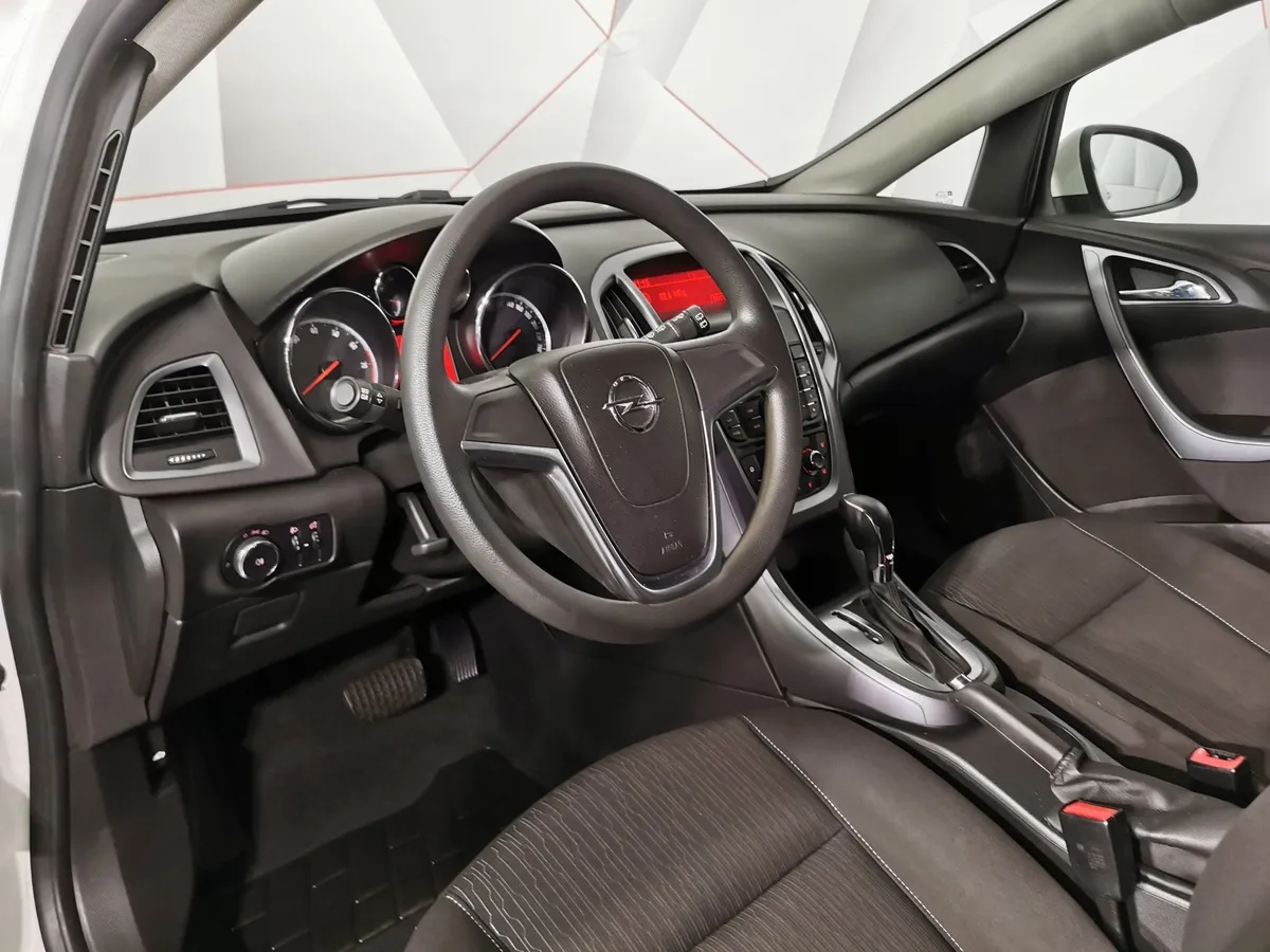 Opel Astra 1.6 AT (115 л.с.) Белый в АВИЛОН. Слайд №18