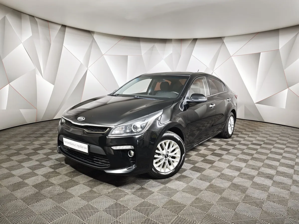 Kia Rio 1.6 AT (123 л.с.) Черный в АВИЛОН. Слайд №1
