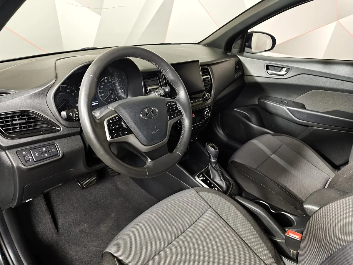 Hyundai Solaris 1.6 AT (123 л.с.) Elegance Черный в АВИЛОН. Слайд №19