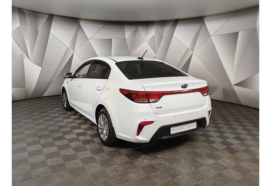 Kia Rio 1.4 AT (100 л.с.) Белый в АВИЛОН. Слайд №4 Kia Rio 1.4 AT (100 л.с.) Белый в АВИЛОН. Слайд №4