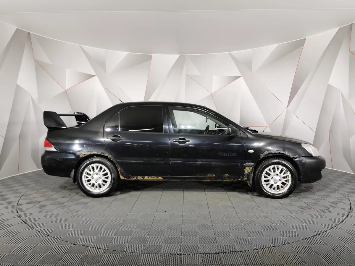 Mitsubishi Lancer 1.3 MT (82 л.с.) Черный в АВИЛОН. Слайд №6