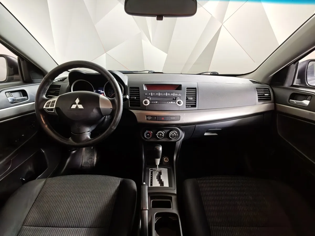 Mitsubishi Lancer 1.6 AT (117 л.с.) Серый в АВИЛОН. Слайд №14