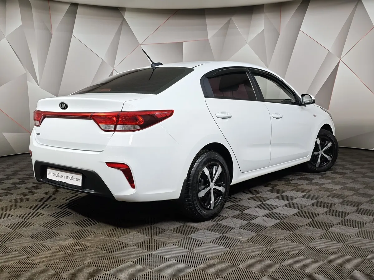 Kia Rio 1.6 AT (123 л.с.) Белый в АВИЛОН. Слайд №2
