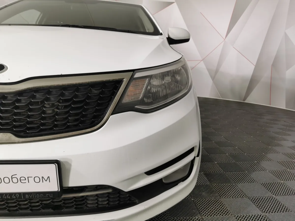 Kia Rio 1.6 MT (123 л.с.) Comfort Белый в АВИЛОН. Слайд №10