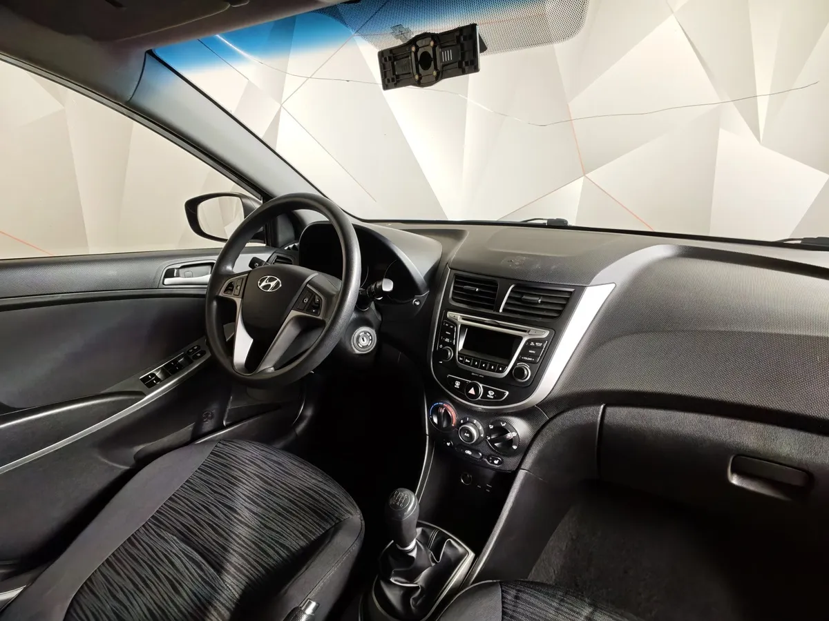 Hyundai Solaris 1.6 MT (123 л.с.) Comfort Черный в АВИЛОН. Слайд №13