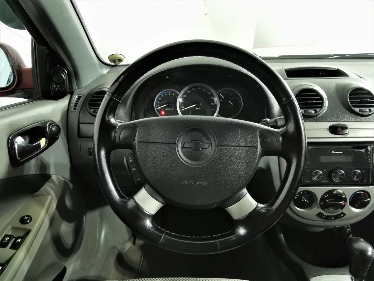 Chevrolet Lacetti 1.6 MT (109 л.с.) Platinum Красный в АВИЛОН. Слайд №19