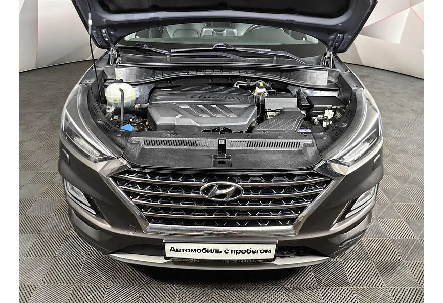 Hyundai Tucson 2.0 CRDi AT 4WD (185 л.с.) High-Tech Коричневый в АВИЛОН. Слайд №11