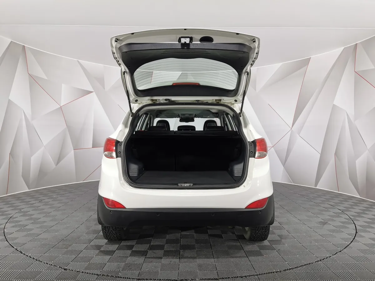 Hyundai ix35 2.0 AT 4WD (150 л.с.) Comfort + Navi Белый в АВИЛОН. Слайд №11