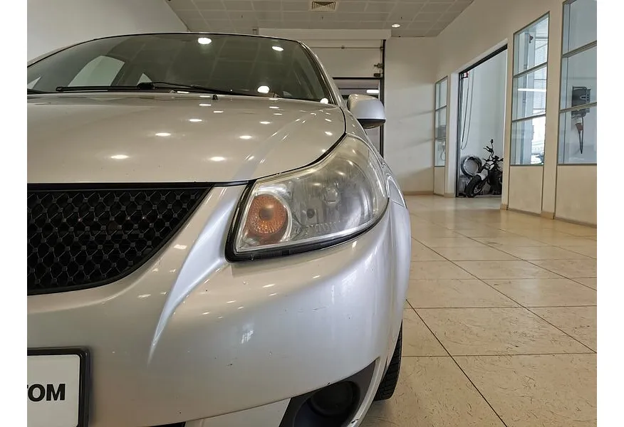 Suzuki SX4 1.6 MT (107 л.с.) Серебристый в АВИЛОН. Слайд №9