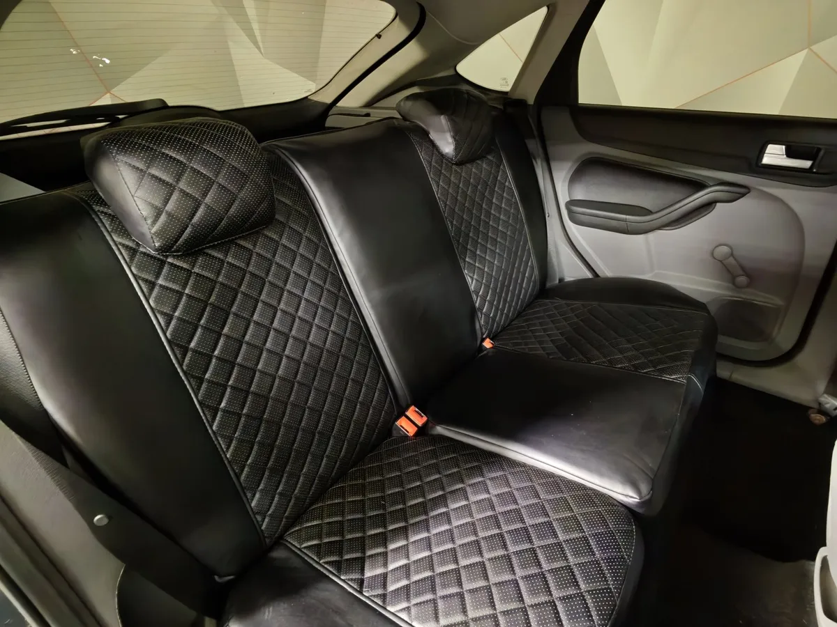 Ford Focus 1.8 MT (125 л.с.) Ghia Черный в АВИЛОН. Слайд №17
