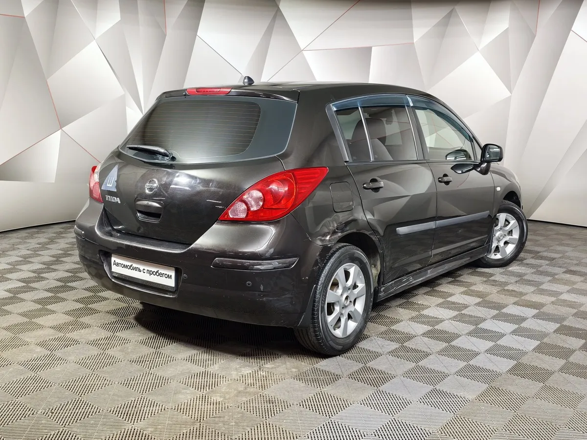 Nissan Tiida 1.6 AT (110 л.с.) Черный в АВИЛОН. Слайд №2