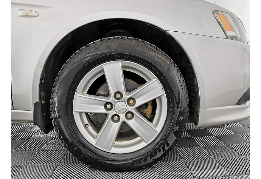 Mitsubishi Lancer 1.6 AT (117 л.с.) Серебристый в АВИЛОН. Слайд №9