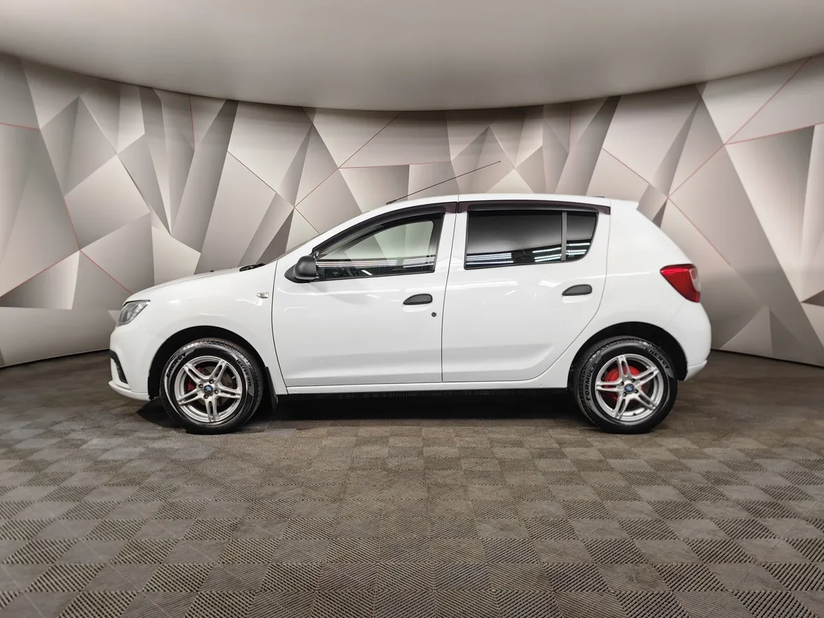 Renault Sandero 1.6 MT (82 л.с.) Confort Белый в АВИЛОН. Слайд №5