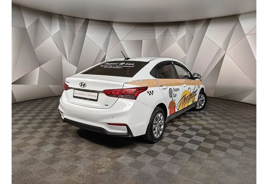 Hyundai Solaris 1.6 AT (123 л.с.) Active Plus Белый в АВИЛОН. Слайд №2