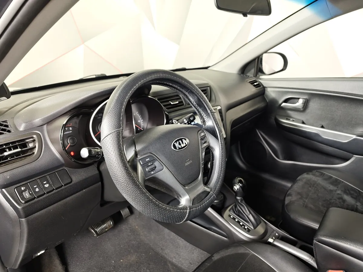 Kia Rio 1.6 AT (123 л.с.) Серый в АВИЛОН. Слайд №19