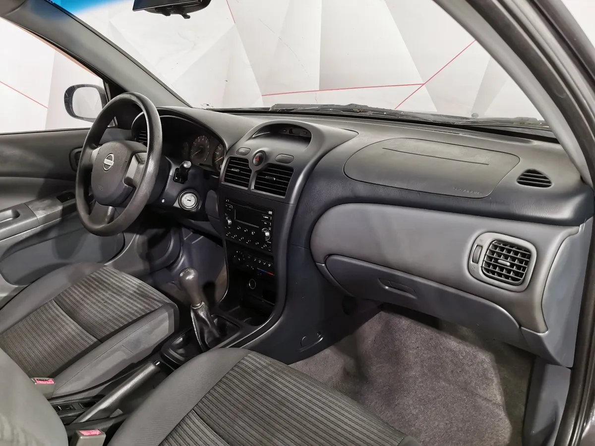 Nissan Almera Classic 1.6 MT (107 л.с.) Черный в АВИЛОН. Слайд №11