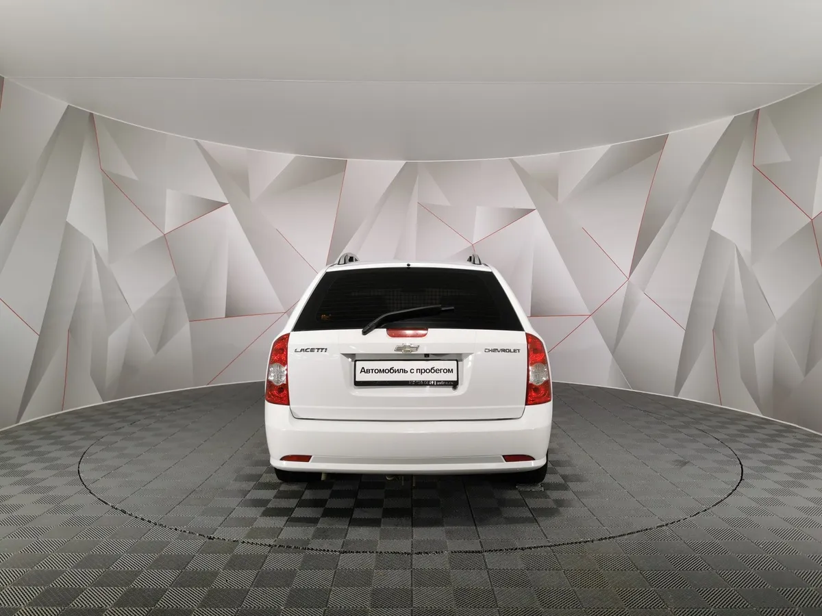 Chevrolet Lacetti 1.6 MT (109 л.с.) Белый в АВИЛОН. Слайд №8