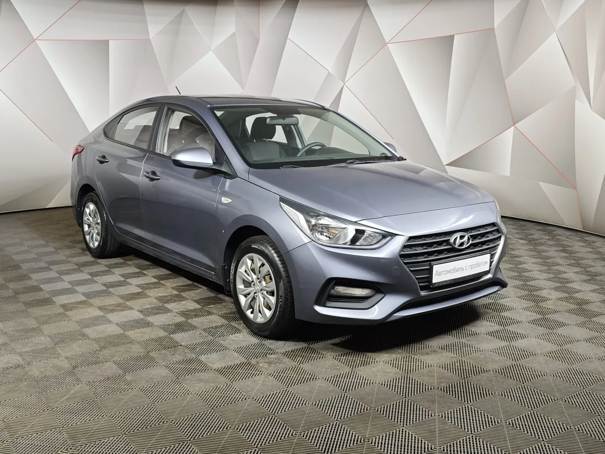 Hyundai Solaris 1.4 AT (100 л.с.) Active Plus Серый в АВИЛОН. Слайд №3