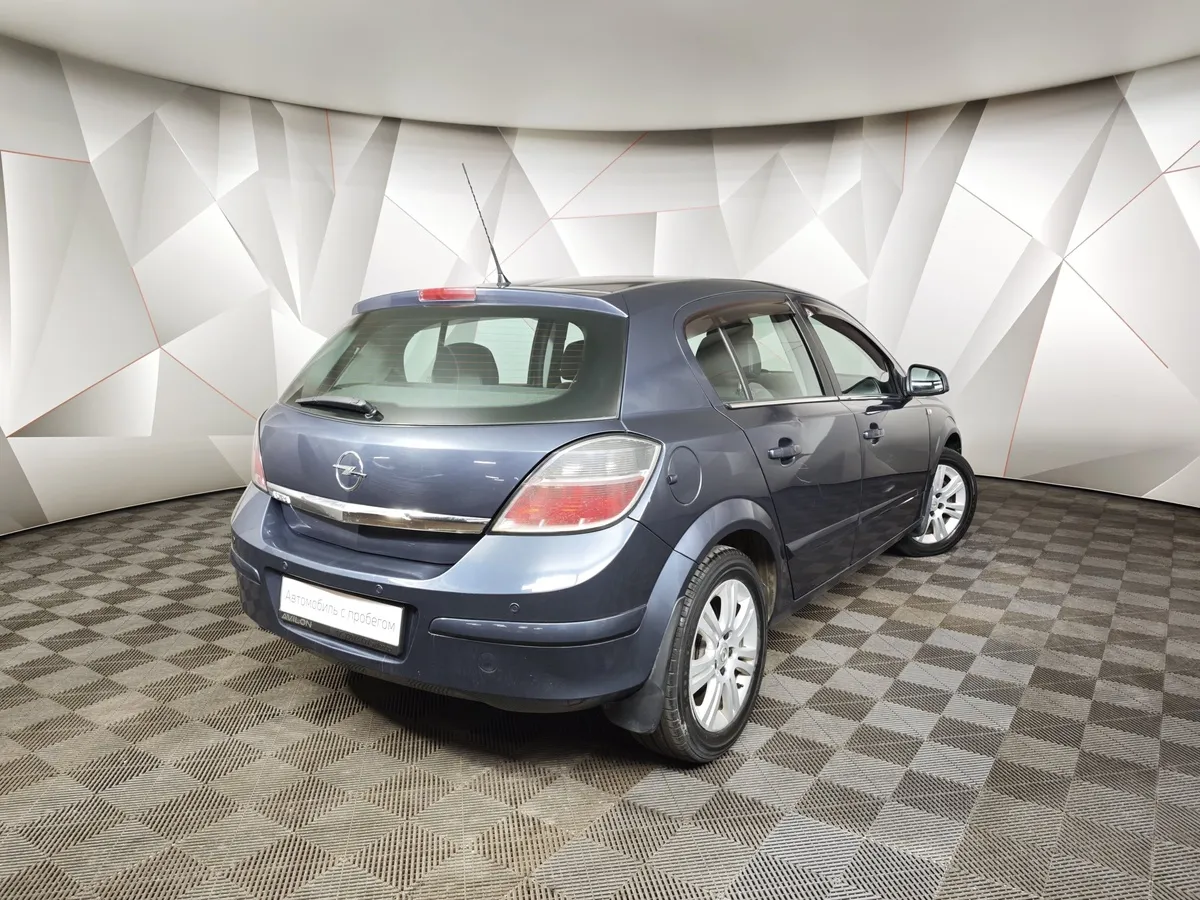 Opel Astra 1.8 AT (140 л.с.) Синий в АВИЛОН. Слайд №2
